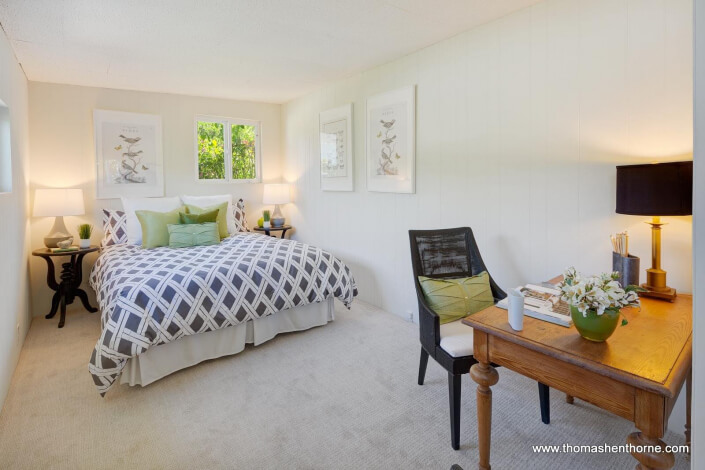 master bedroom with bed and window