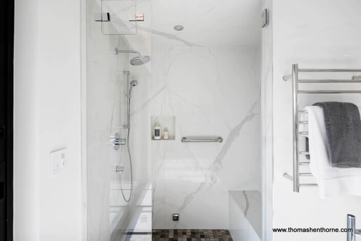 luxury home bathroom with marble walls