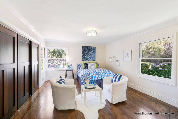 bedroom with wood floors