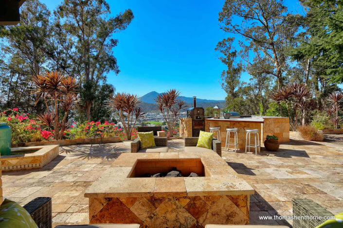 fire pit and outdoor kitchen / bar