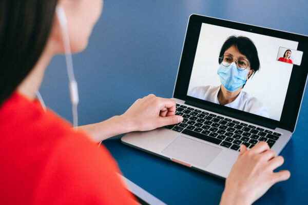 covid vaccine marin county doctor on laptop