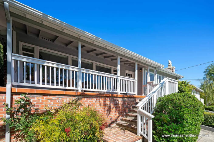 home with front porch and railing