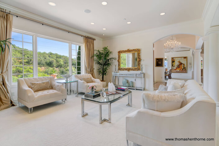 living room with sofa and two chairs