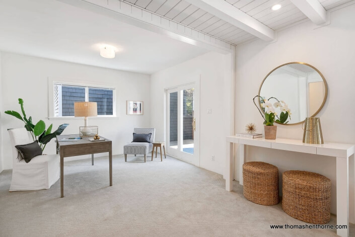 room with beamed ceilings and home office