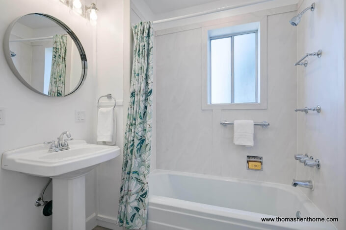 bathroom with tub shower combo