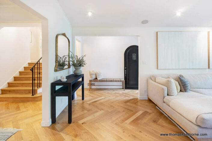 living room with herringbone oak floor