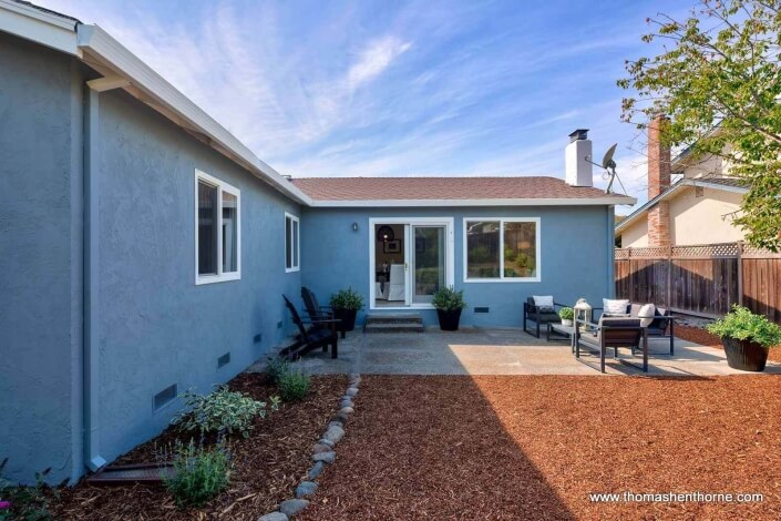 backyard of home with seating area