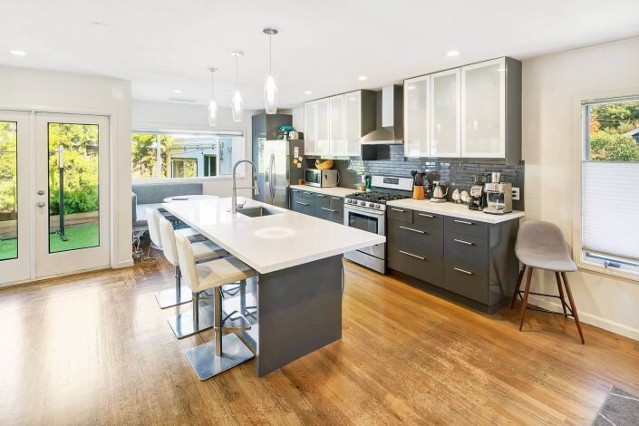 Kitchen with center island and stainless appliances