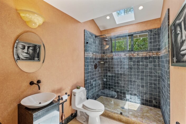 bathroom with tile shower