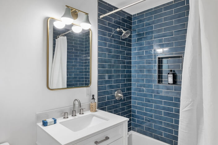 Bathroom vanity and blue tile