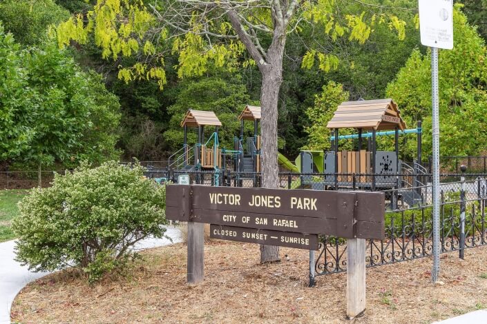Victor Jones Park sign and playstructures in San Rafael