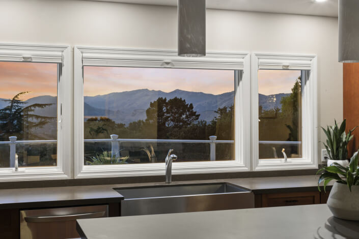 View of mountains over kitchen sink