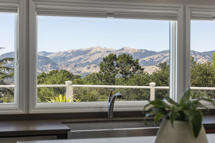 View of mountains from kitchen sink