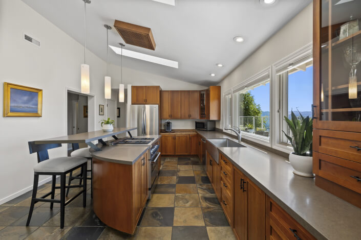 Kitchen with stainless appliances and wood cabinets