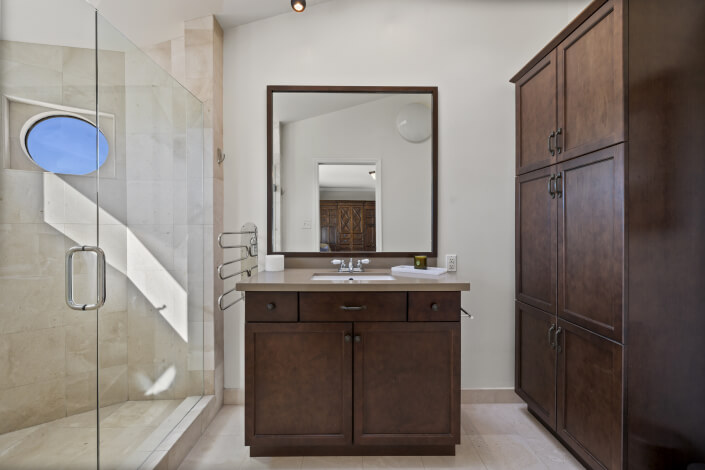 Primary bathroom with glass walk in shower