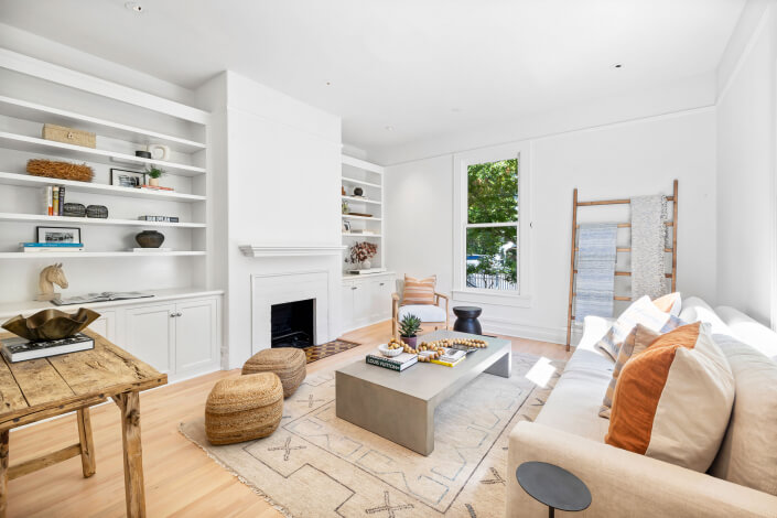 Family room with built-in book cases and cabinetry