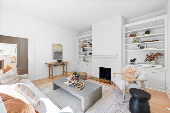 Family room with built-in book cases and cabinetry