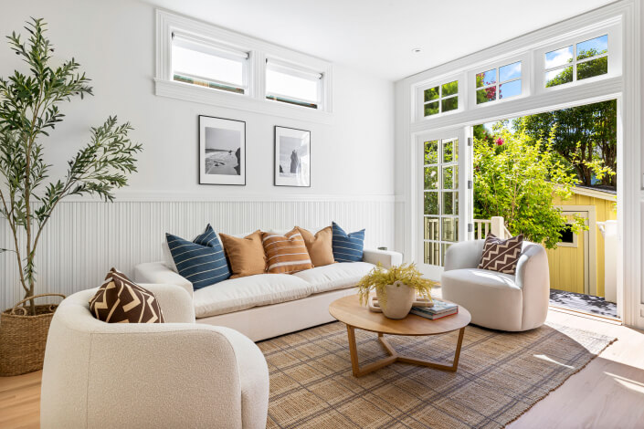 Sofa and chairs near french doors