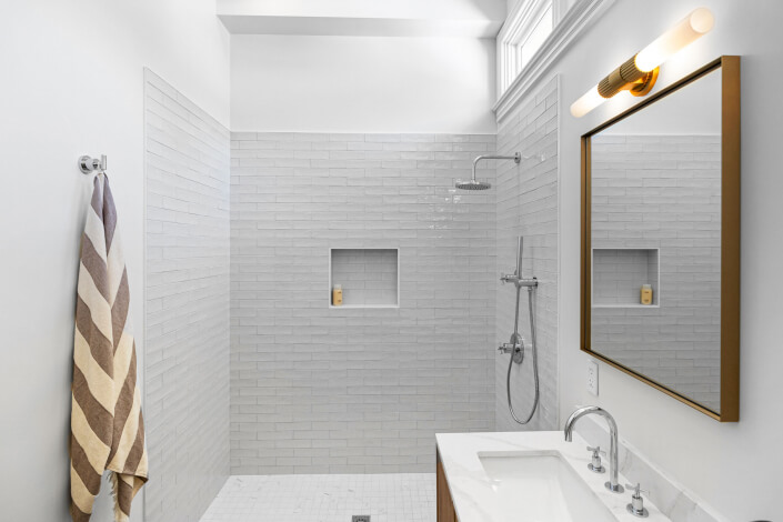 Bathroom with tile walk in shower