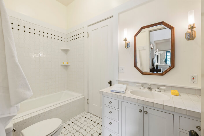 Bathroom with tub shower and sink