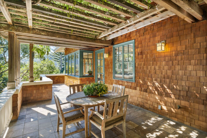 Side patio with table and chairs